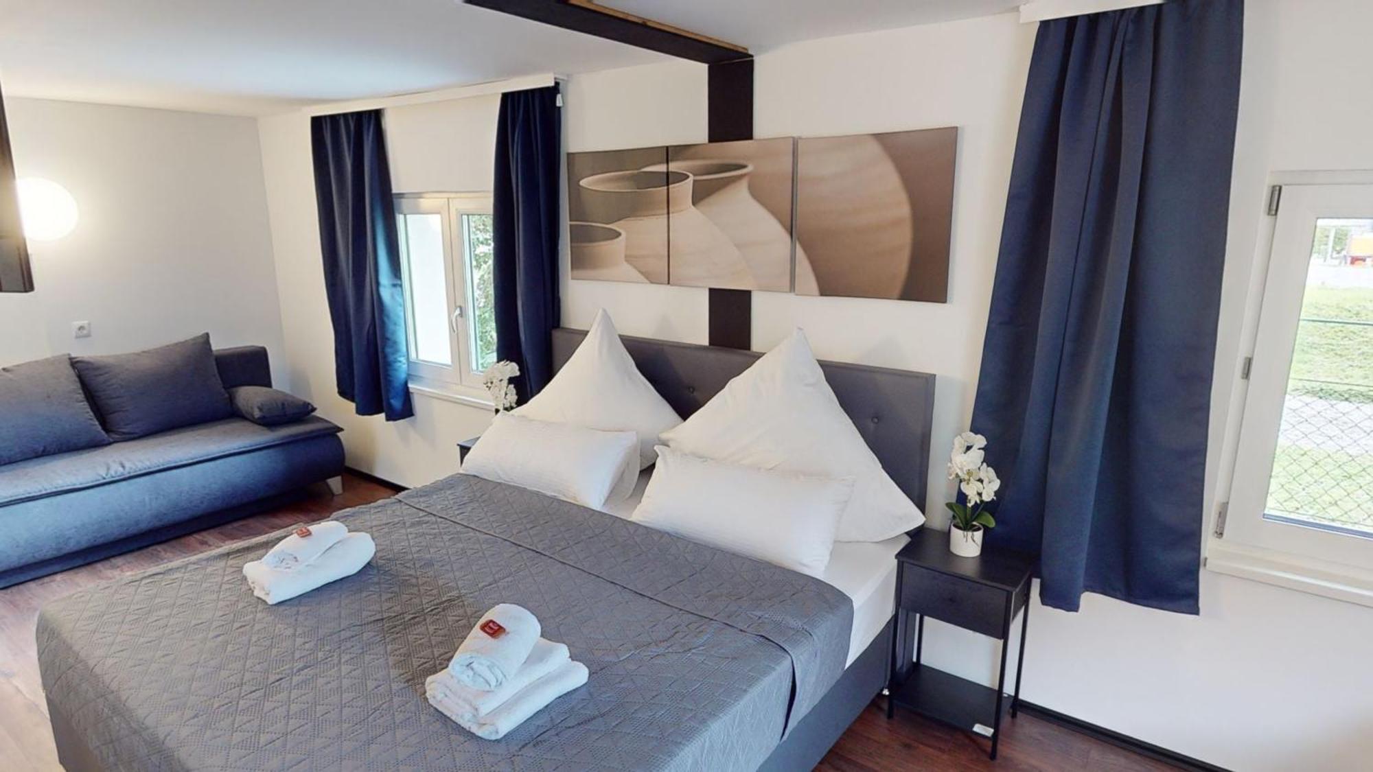 Crown Living Design Loft, Kueche, Bibliothek, Gartensitzplatz Apartment Lustenau